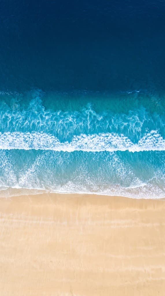 Aerial view of beach and ocean — LimitBreak agency services